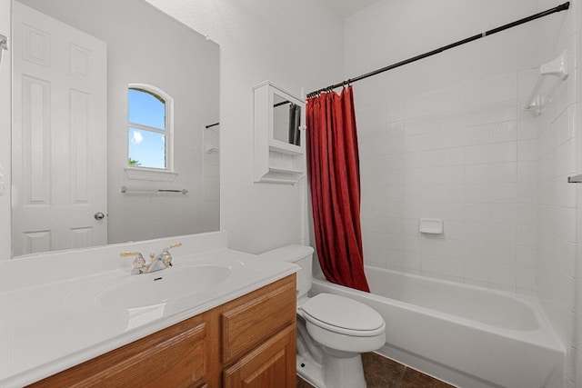 bathroom with toilet, shower / bath combo, and vanity