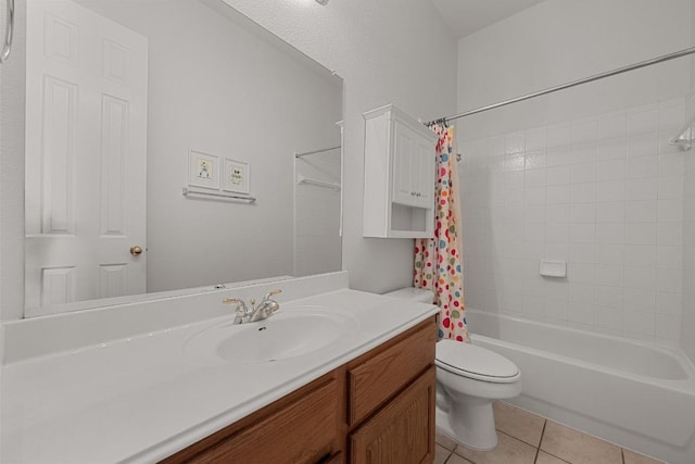 full bath with toilet, tile patterned flooring, vanity, and shower / tub combo with curtain