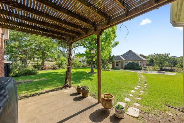 117 Hucks Hideaway, Dripping Springs, TX 78620 - view of grassy yard featuring a patio and an outdoor fire pit