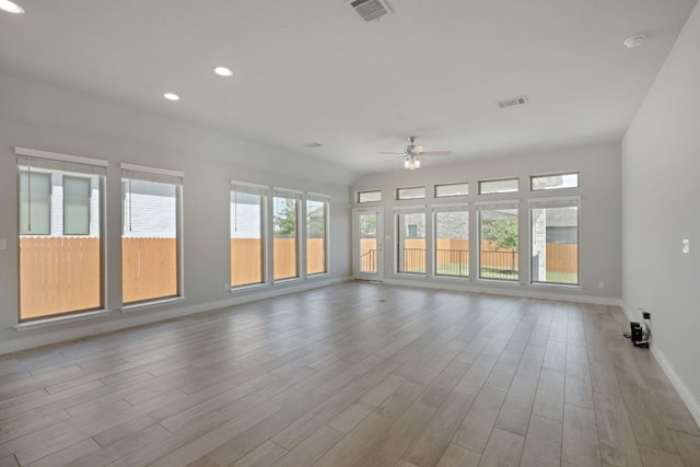 unfurnished living room with ceiling fan, baseboards, wood finished floors, and recessed lighting