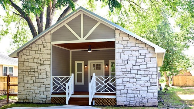 406 Rivers St, Smithville, TX 78957 - view of outbuilding featuring fence and covered porch