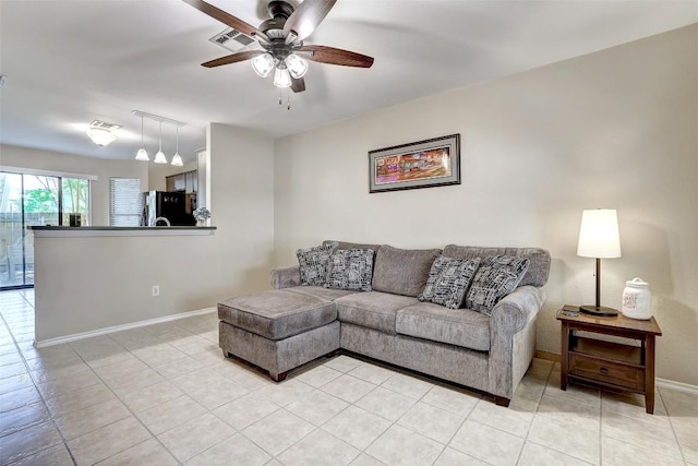 11901 Swearingen Dr Unit 110, Austin, TX 78758 - living room featuring ceiling fan and light tile patterned floors
