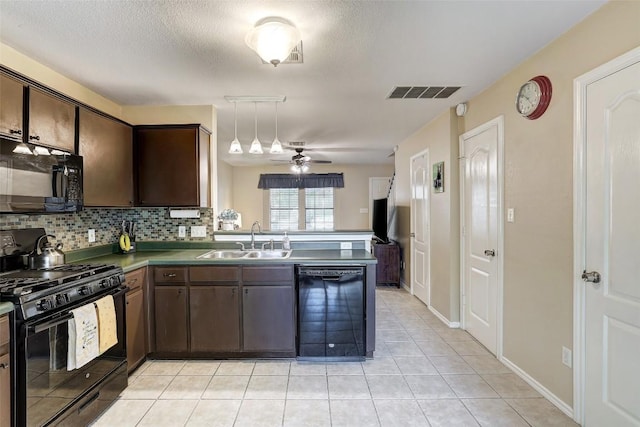 11901 Swearingen Dr Unit 110, Austin, TX 78758 - kitchen featuring black appliances, a peninsula, ceiling fan, light tile patterned flooring, and dark brown cabinetry