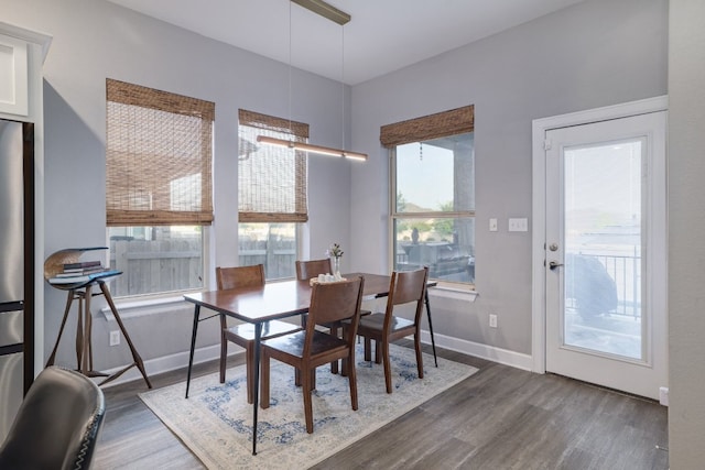 3405 Eagle Ridge Ln, Pflugerville, TX 78660 - dining space featuring wood finished floors and baseboards