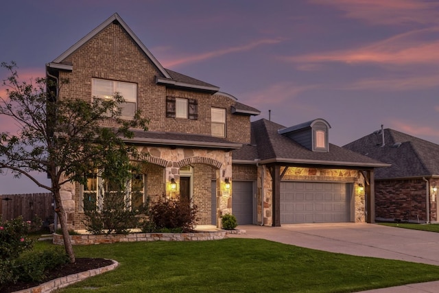 3405 Eagle Ridge Ln, Pflugerville, TX 78660 - view of front of house with brick siding, driveway, a garage, and a shingled roof
