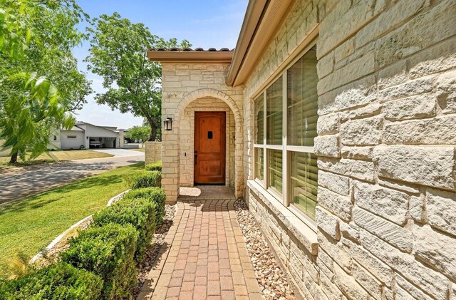 101 Blanco Ct, Horseshoe Bay, TX 78657 - property entrance with stone siding