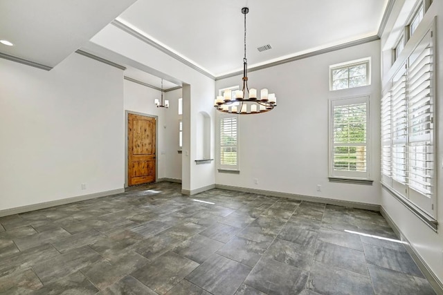 101 Blanco Ct, Horseshoe Bay, TX 78657 - unfurnished dining area with a chandelier, healthy amount of natural light, baseboards, crown molding, and a high ceiling