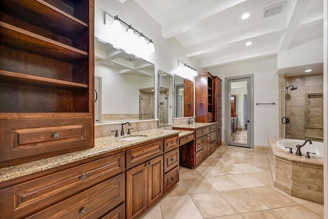 101 Blanco Ct, Horseshoe Bay, TX 78657 - full bathroom featuring a stall shower, beamed ceiling, tile patterned floors, vanity, and a bath