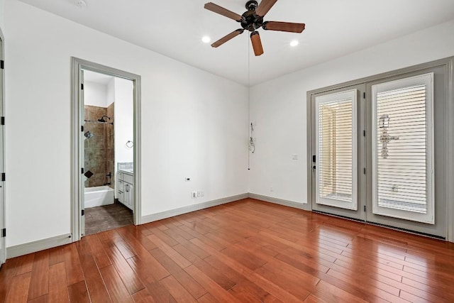 101 Blanco Ct, Horseshoe Bay, TX 78657 - spare room with ceiling fan, baseboards, wood finished floors, and recessed lighting