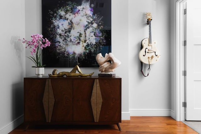 detailed view of wood finished floors and baseboards