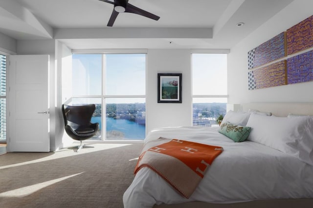 bedroom featuring carpet and a ceiling fan