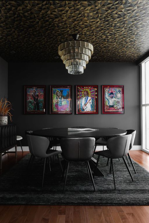 dining area with a chandelier, wood finished floors, and baseboards