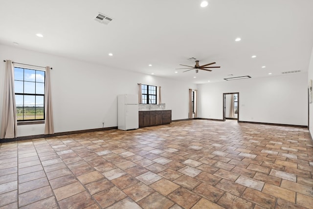 112 Oak Ct, Bastrop, TX 78602 - spare room with baseboards, plenty of natural light, recessed lighting, and a ceiling fan