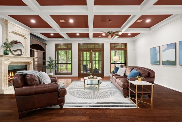 112 Oak Ct, Bastrop, TX 78602 - living room with baseboards, a fireplace, wood finished floors, a ceiling fan, and coffered ceiling