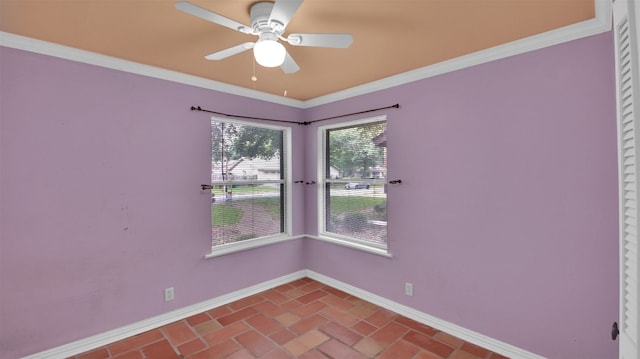 unfurnished room featuring baseboards, ornamental molding, and ceiling fan