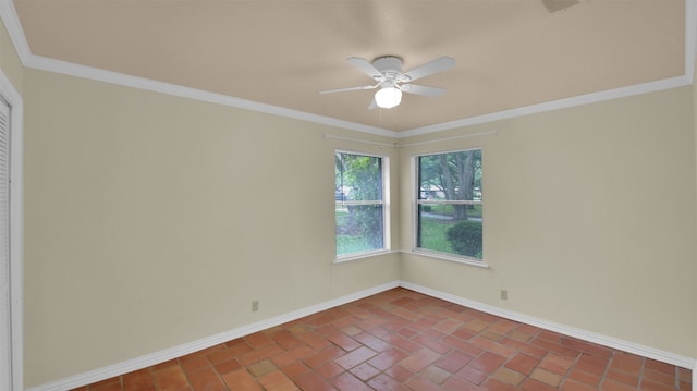 empty room with ceiling fan, baseboards, and ornamental molding