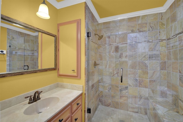 full bath with a shower stall, ornamental molding, and vanity