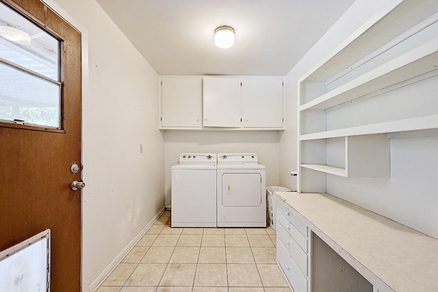 3305 Carol Ann Dr, Austin, TX 78723 - washroom with washing machine and dryer, cabinet space, light tile patterned floors, and baseboards