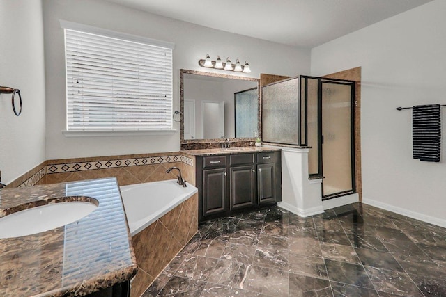 109 Lake Livingston Dr, Georgetown, TX 78628 - bathroom with vanity, a shower stall, and a garden tub