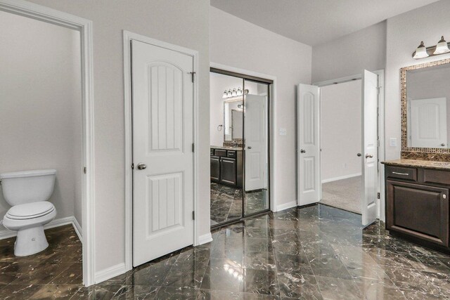 109 Lake Livingston Dr, Georgetown, TX 78628 - full bathroom featuring vanity and marble tiled floors