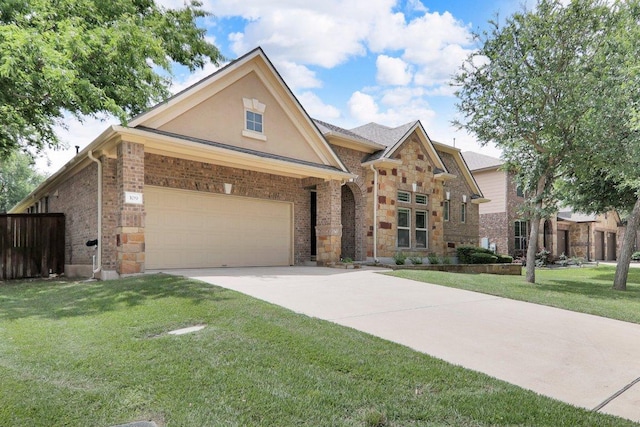 109 Lake Livingston Dr, Georgetown, TX 78628 - view of front of house featuring driveway, a front yard, a garage, stone siding, and stucco siding