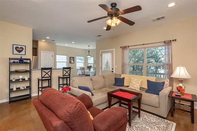 17219 Oak Cliff Cir, Dripping Springs, TX 78620 - living area featuring healthy amount of natural light, baseboards, recessed lighting, and a ceiling fan