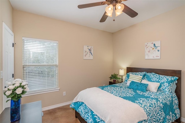 17219 Oak Cliff Cir, Dripping Springs, TX 78620 - bedroom with carpet flooring, baseboards, and a ceiling fan