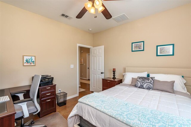 17219 Oak Cliff Cir, Dripping Springs, TX 78620 - bedroom with an office area, carpet floors, ceiling fan, and baseboards