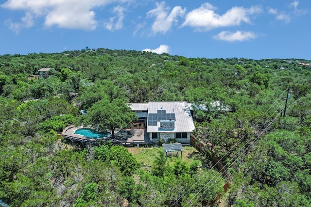 1004 Castle Ridge Rd, Austin, TX 78746 - aerial view of property and surrounding area with a heavily wooded area and a pool area