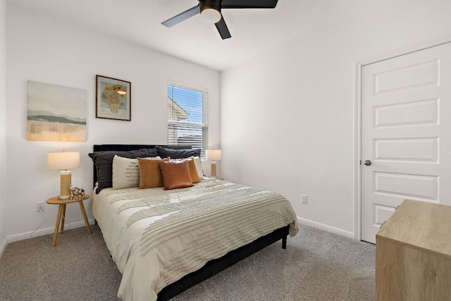 bedroom with light carpet, baseboards, and ceiling fan