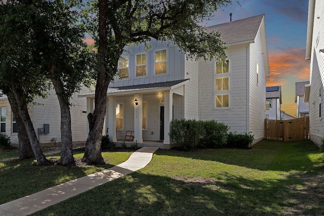 view of front of house with covered porch and board and batten siding