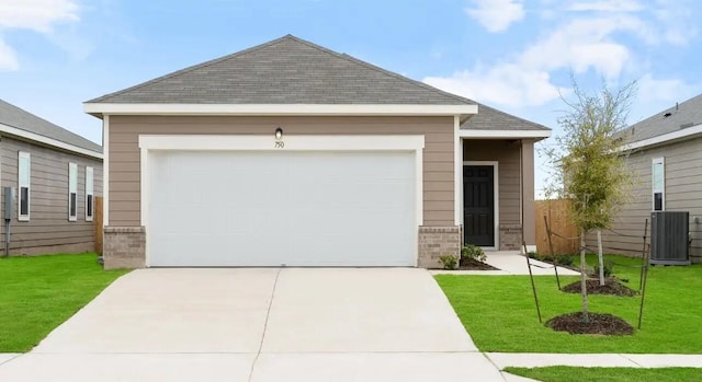 view of front of home with brick siding, concrete driveway, central AC unit, and an attached garage