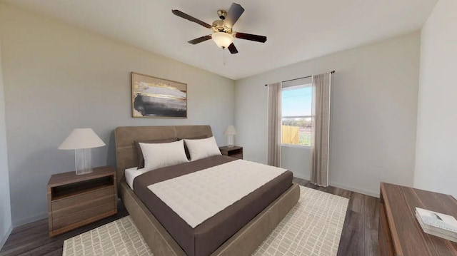 bedroom featuring wood finished floors, baseboards, and ceiling fan