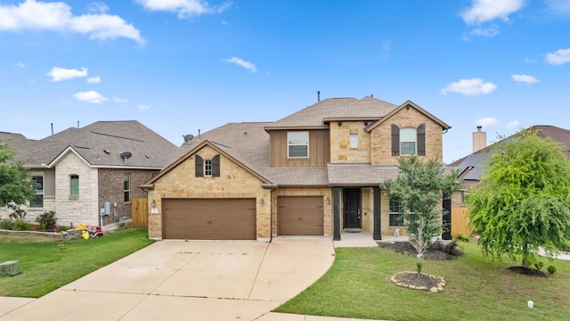 221 Mandana St, Leander, TX 78641 - view of front facade featuring driveway, a shingled roof, a front yard, brick siding, and a garage
