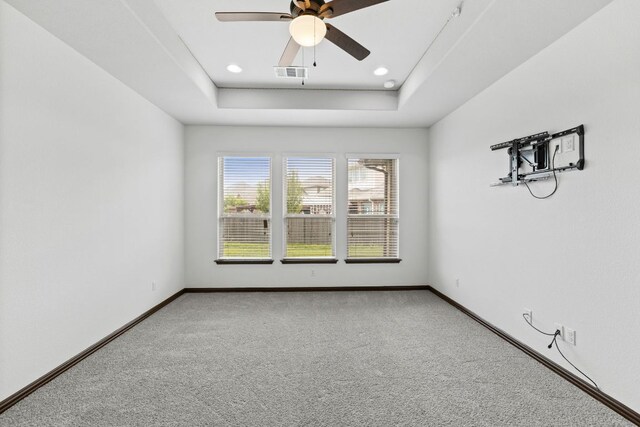 221 Mandana St, Leander, TX 78641 - unfurnished room with carpet floors, a tray ceiling, ceiling fan, and recessed lighting