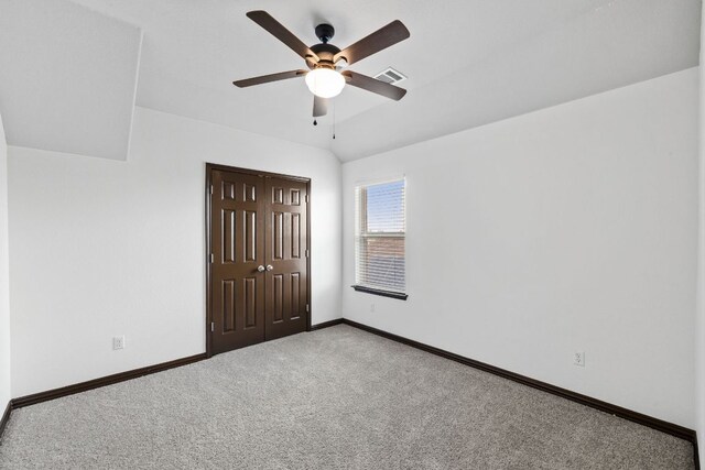 221 Mandana St, Leander, TX 78641 - unfurnished bedroom featuring carpet flooring, a closet, and a ceiling fan