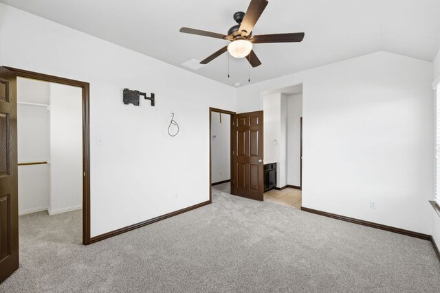 221 Mandana St, Leander, TX 78641 - unfurnished bedroom with light carpet, a spacious closet, and a closet