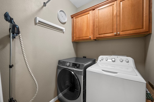 191 Fresno Spgs, Buda, TX 78610 - washroom with cabinet space and independent washer and dryer