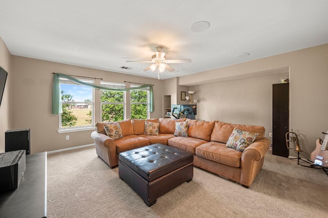 191 Fresno Spgs, Buda, TX 78610 - living area featuring light colored carpet, a ceiling fan, and baseboards