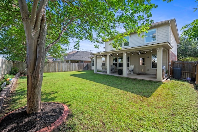 191 Fresno Spgs, Buda, TX 78610 - back of property with a patio area, a ceiling fan, and central AC unit