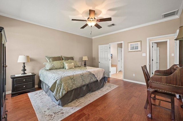191 Fresno Spgs, Buda, TX 78610 - bedroom featuring wood finished floors, crown molding, baseboards, and ceiling fan