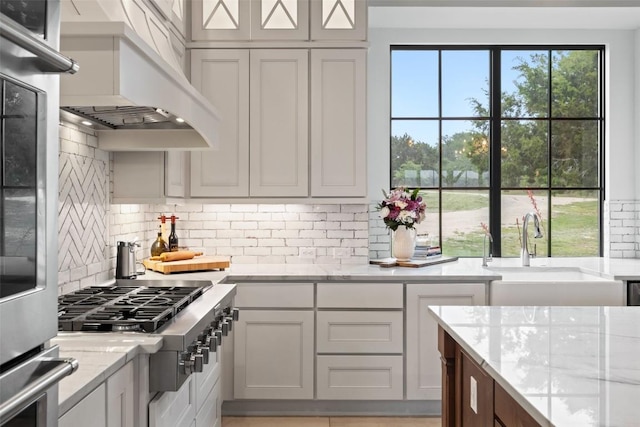 1278 Sanctuary Ln, Blanco, TX 78606 - kitchen featuring a sink, custom exhaust hood, stainless steel appliances, and healthy amount of natural light