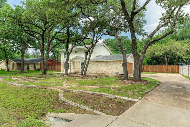 2105 Emerald Isle Dr, Leander, TX 78641 - view of side of property with stone siding and driveway