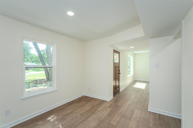 2105 Emerald Isle Dr, Leander, TX 78641 - empty room featuring wood finished floors, baseboards, and recessed lighting