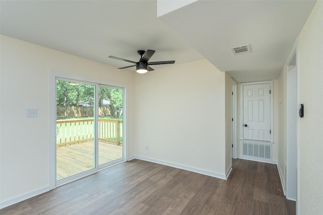 2105 Emerald Isle Dr, Leander, TX 78641 - spare room featuring wood finished floors, ceiling fan, and baseboards