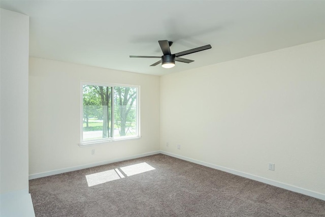 2105 Emerald Isle Dr, Leander, TX 78641 - spare room featuring a ceiling fan, carpet flooring, and baseboards