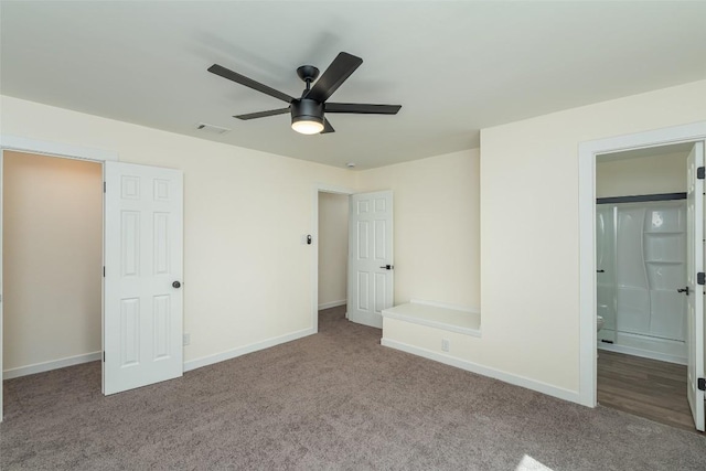 2105 Emerald Isle Dr, Leander, TX 78641 - unfurnished bedroom with carpet, baseboards, and ensuite bath