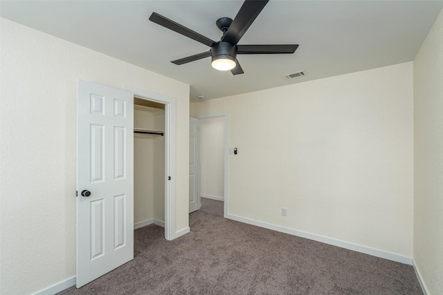2105 Emerald Isle Dr, Leander, TX 78641 - unfurnished bedroom with carpet flooring, baseboards, a closet, and a ceiling fan