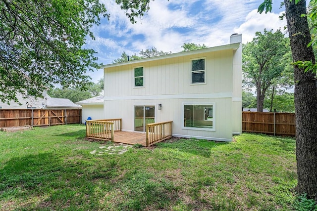 2105 Emerald Isle Dr, Leander, TX 78641 - rear view of house with a chimney and a deck
