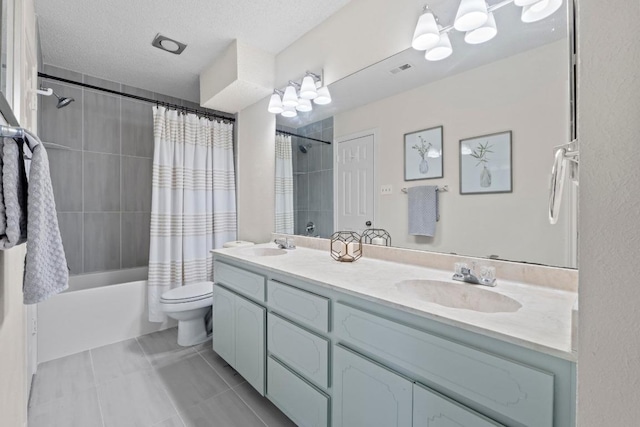 8805 Clearbrook Trl Unit A, Austin, TX 78729 - bathroom featuring double vanity, toilet, shower / bathtub combination with curtain, tile patterned flooring, and a chandelier